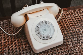 a cream coloured telephone.